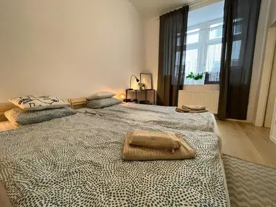 Ein Bett oder Betten in einem Zimmer der Unterkunft Altbau mit Stil im Dritten