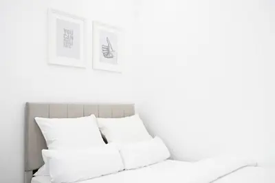 Ein Bett oder Betten in einem Zimmer der Unterkunft Design Wohnung nahe dem Zentrum