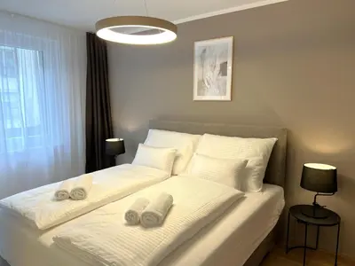 Ein Bett oder Betten in einem Zimmer der Unterkunft Free Parking - City Pulse Apartments at U6-Metro Vienna