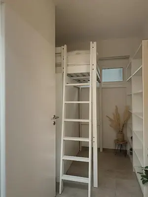 Ein Etagenbett oder Etagenbetten in einem Zimmer der Unterkunft Dreamy Garden Residence