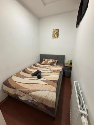 Ein Bett oder Betten in einem Zimmer der Unterkunft ANDA CITY ROOMs