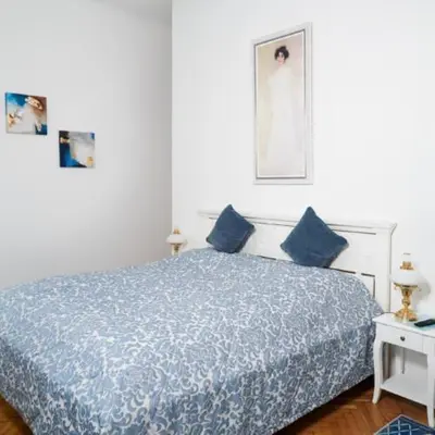Ein Bett oder Betten in einem Zimmer der Unterkunft Klimtsuites