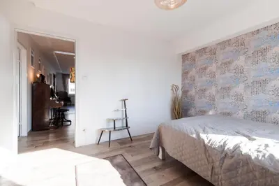 Ein Bett oder Betten in einem Zimmer der Unterkunft Boho Apartment Vienna