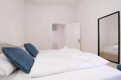 Ein Bett oder Betten in einem Zimmer der Unterkunft Belvedere City Apartment
