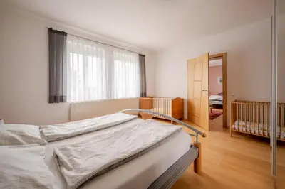 Ein Bett oder Betten in einem Zimmer der Unterkunft Winzerferienhaus Schüller