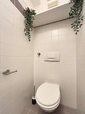 Ein Badezimmer in der Unterkunft Takara Living 24 mit Terrasse