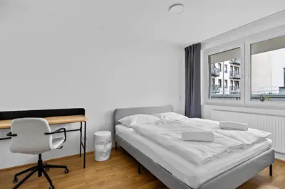 Ein Bett oder Betten in einem Zimmer der Unterkunft HIRSCH Apartments
