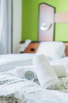 Ein Bett oder Betten in einem Zimmer der Unterkunft Vienna West Business Inn