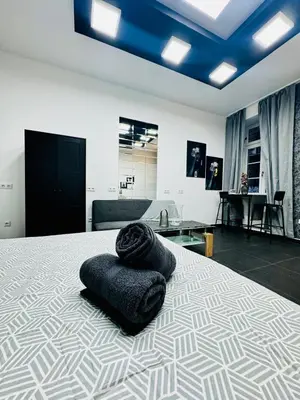 Ein Bett oder Betten in einem Zimmer der Unterkunft Studio Apartment For 3 People, 15 Minutes to Rathausplatz