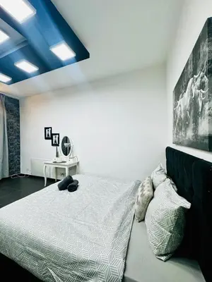Ein Bett oder Betten in einem Zimmer der Unterkunft Studio Apartment For 3 People, 15 Minutes to Rathausplatz