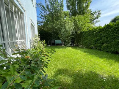 Ein Garten an der Unterkunft Skyvilla Wien - Gartenwohnung