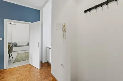 Ein Bett oder Betten in einem Zimmer der Unterkunft Cozy Living Apartment 