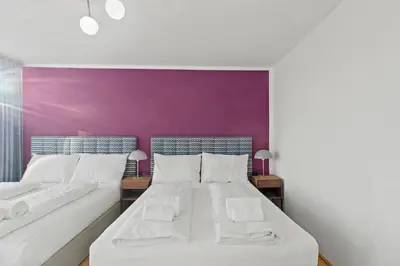 Ein Bett oder Betten in einem Zimmer der Unterkunft Cozy Living Apartment 