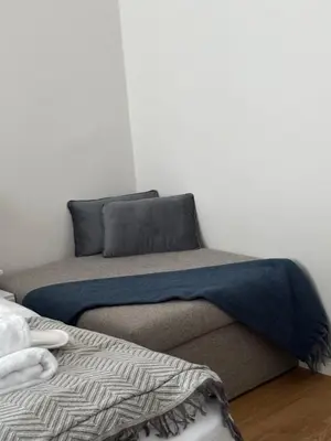 Ein Bett oder Betten in einem Zimmer der Unterkunft Apartment Noble in Vienna's City Center