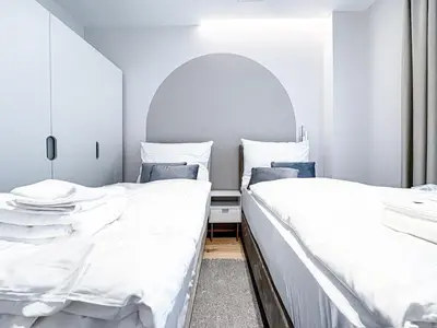 Ein Bett oder Betten in einem Zimmer der Unterkunft Apartment Magnificence in Vienna's City Center