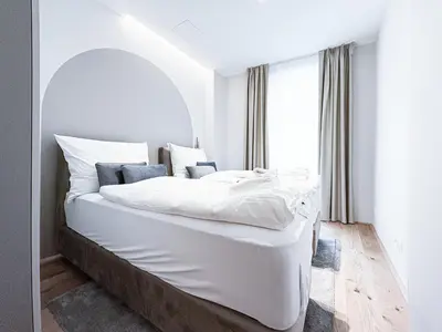 Ein Bett oder Betten in einem Zimmer der Unterkunft Apartment Magnificence in Vienna's City Center