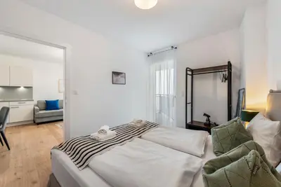 Ein Bett oder Betten in einem Zimmer der Unterkunft Vienna Hills Living