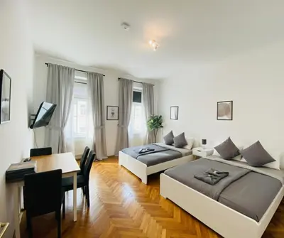 Ein Bett oder Betten in einem Zimmer der Unterkunft Stylish Flat with 2 Double Beds for 4 people 15a