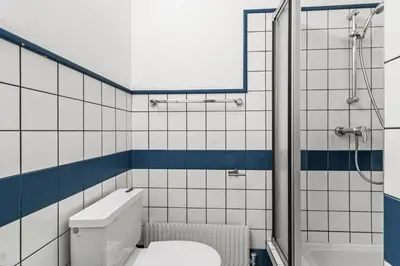 Ein Badezimmer in der Unterkunft Votivpark Rooms I Self Check In