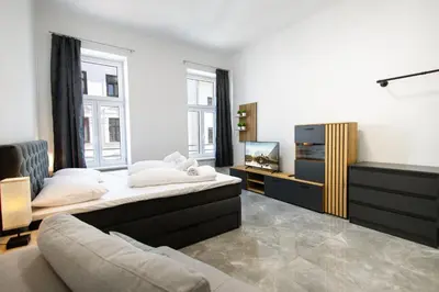 Ein Bett oder Betten in einem Zimmer der Unterkunft Vienna-Apartments Leopoldstadt