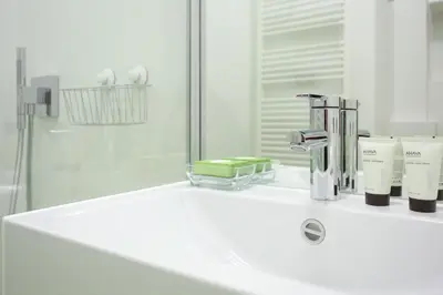 Ein Badezimmer in der Unterkunft Green Mango City Condo