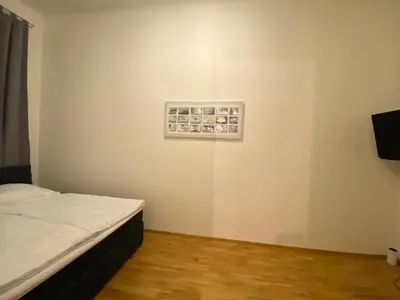 Ein Bett oder Betten in einem Zimmer der Unterkunft Stilvolles Wohnen Taborstraße