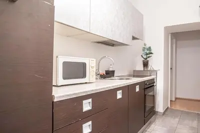 Küche/Küchenzeile in der Unterkunft Central Belvedere 3BR Shared Apartment - 12 min from City Center