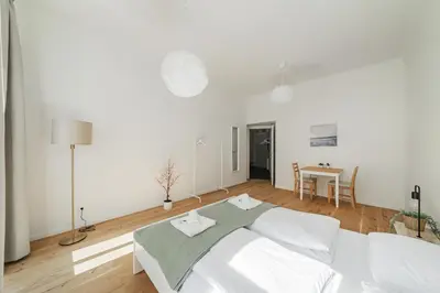 Ein Bett oder Betten in einem Zimmer der Unterkunft Smart Living Apartments - Hauptbahnhof