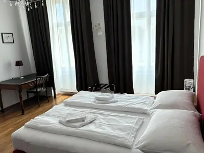 Ein Bett oder Betten in einem Zimmer der Unterkunft Casa Nostra - Ausgefallene Wohnung am Augarten