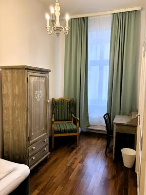 Ein Bett oder Betten in einem Zimmer der Unterkunft Casa Nostra - Ausgefallene Wohnung am Augarten