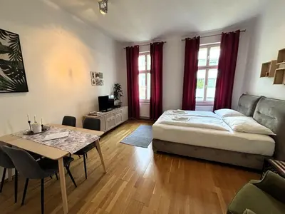 Ein Bett oder Betten in einem Zimmer der Unterkunft Casa Nostra - Helle Wohnung - direkt am Augarten