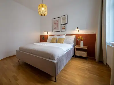 Ein Bett oder Betten in einem Zimmer der Unterkunft Shopping & Strolling Mariahilf