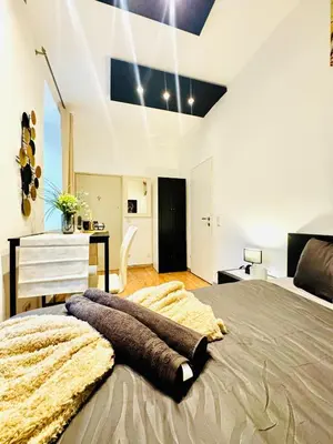 Ein Bett oder Betten in einem Zimmer der Unterkunft Studio for Two Close to Historic Rathausplatz