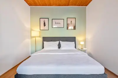 Ein Bett oder Betten in einem Zimmer der Unterkunft Central & Quiet 3rd District Walk all sights