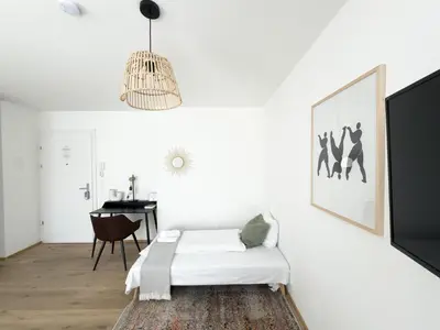 Ein Bett oder Betten in einem Zimmer der Unterkunft Hills Residences