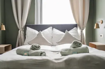 Ein Bett oder Betten in einem Zimmer der Unterkunft HOME1 - Douzième Boutique Hostel