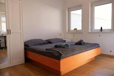 Ein Bett oder Betten in einem Zimmer der Unterkunft Seeappartements Stadtflucht