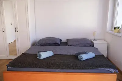 Ein Bett oder Betten in einem Zimmer der Unterkunft Seeappartements Stadtflucht