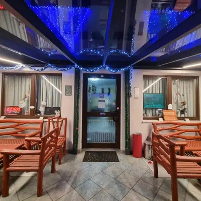 Ein Sitzbereich in der Unterkunft Hotel Sananda-Farm