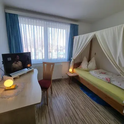 Ein Bett oder Betten in einem Zimmer der Unterkunft Hotel Sananda-Farm