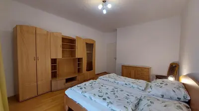 Ein Bett oder Betten in einem Zimmer der Unterkunft Wohnung Simmering neben U&S-Bahn
