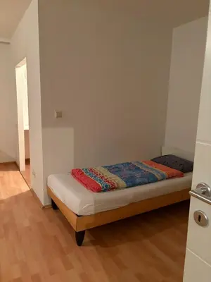 Ein Bett oder Betten in einem Zimmer der Unterkunft Hostel am Brunnenmarkt