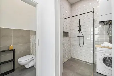 Ein Badezimmer in der Unterkunft Apartments Maximilian