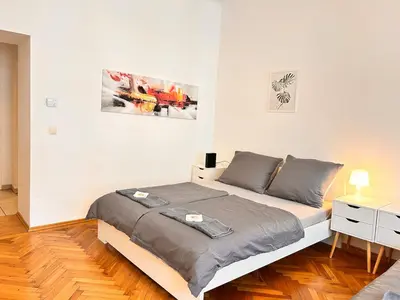 Ein Bett oder Betten in einem Zimmer der Unterkunft Charming Loft for 4 Guests in Vienna 20