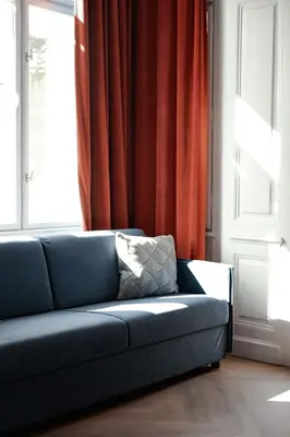 Ein Sitzbereich in der Unterkunft hideauts hotels Villa R