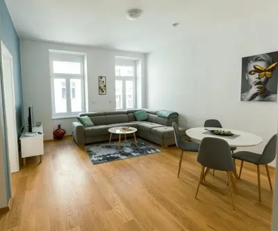 Ein Sitzbereich in der Unterkunft New Design Apartment 9