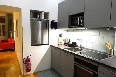 Küche/Küchenzeile in der Unterkunft Charmante neu renovierte Wohnung in der Nähe des Stadtzentrums