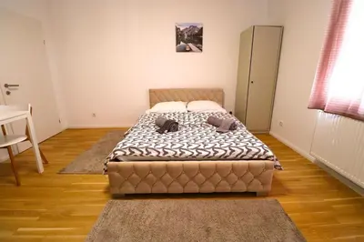 Ein Bett oder Betten in einem Zimmer der Unterkunft Diamond Home Apartments