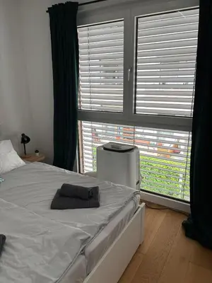 Ein Bett oder Betten in einem Zimmer der Unterkunft Wiener Townhouse Prater