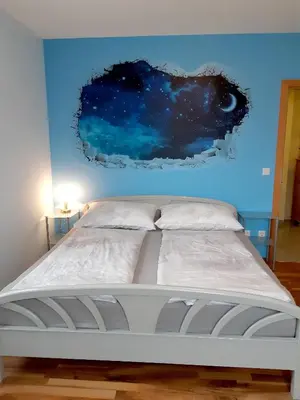 Ein Bett oder Betten in einem Zimmer der Unterkunft Appartementhaus Freiler
